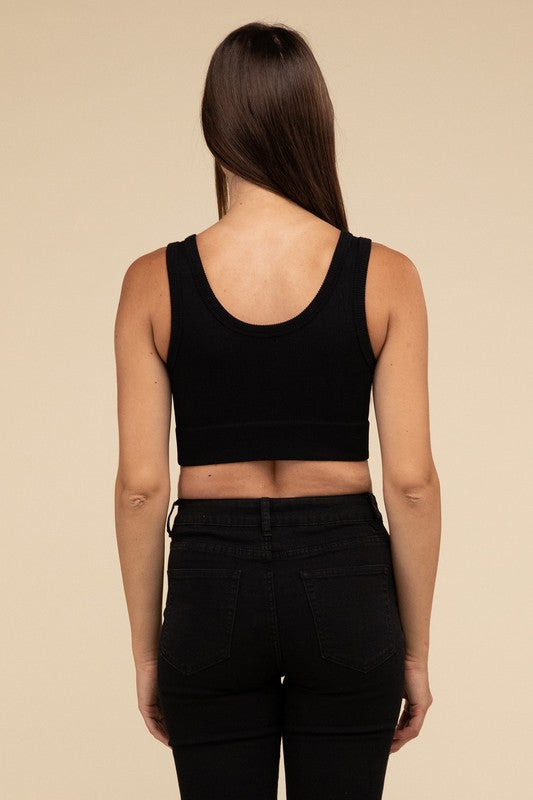 Ribbed Seamless Crop TopElevate your summer essentials with our Ribbed Seamless Crop Top, a versatile piece perfect for layering or wearing solo. Crafted with comfort in mind, it boasts a f