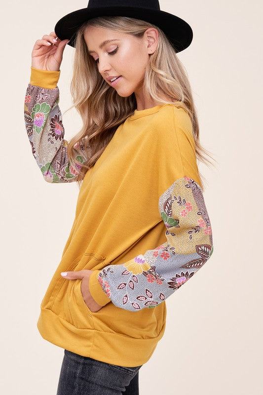 WOVEN FLORAL MIXED TOPFRENCH TERRY SOLID AND WOVEN FLORAL PRINT MIXED LONG SLEEVE SIDE POCKET RAW EDGE DETAIL TOP - MADE IN U.S.A.
Style: Casual
Print / Pattern: SOLID AND WOVEN FLORAL 
F