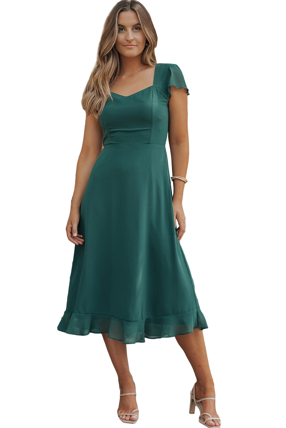 Sea Green Shirred Open Back Sweetheart Neck Ruffled Midi DressMaterial:100%Polyester



		This elegant dress gives a fit flare silhouette
	
	
		The sweetheart neck, flutter sleeve and ruffled hem are designed to graceful
