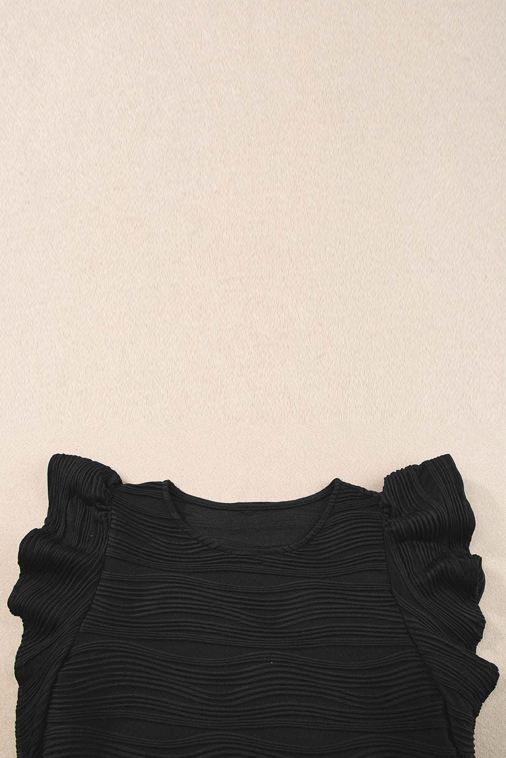 Black Plain Wavy Textured Ruffle Sleeve BlouseMaterial:90%Polyester+10%Elastane



		The wavy textured fabric adds an extra layer of sophistication, making this top a standout choice. 
	
	
		Embrace a playf