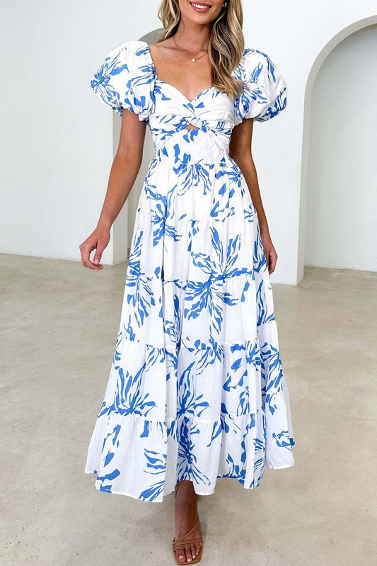 White Abstract Print Bubble Sleeve Swing High End Dress• Effortlessly chic, this dress exudes elegance with its delicate floral pattern and bubble sleeves, perfect for a high-end event.
• The V-neck design adds a touch 