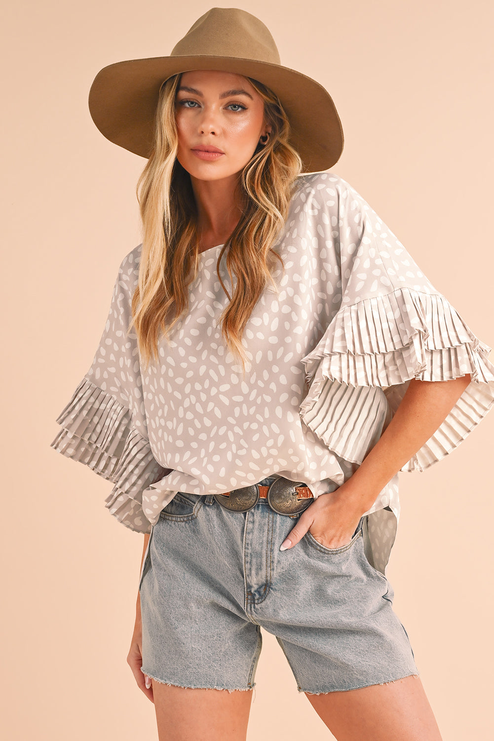 Khaki Spotted Print Loose Fit Ruffle Sleeve BlouseMaterial:100%Polyester



		The blouse is designed with a loose fit, which means it has a relaxed and comfortable silhouette.
	
	
		The ruffles add a feminine a