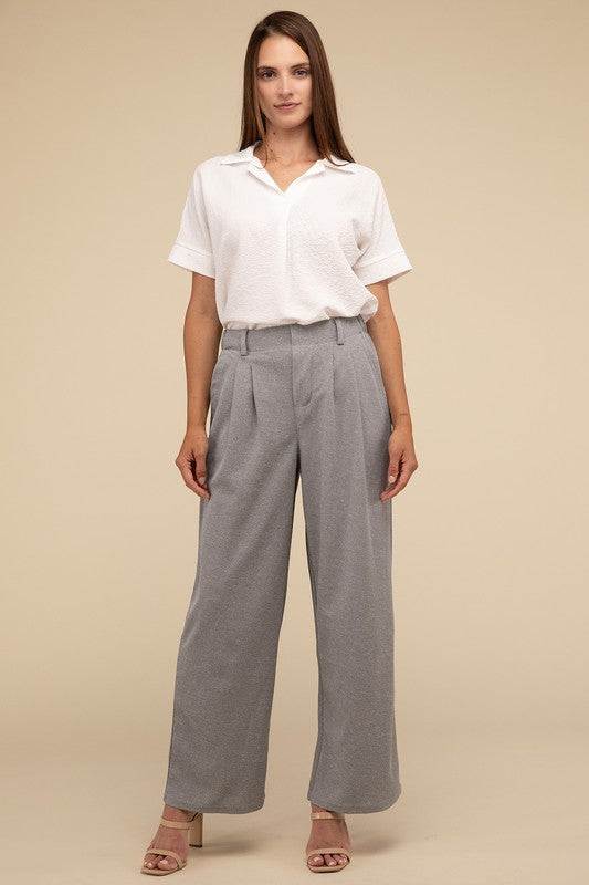 Waffle Trouser PantsElevate your everyday style with these waffle trouser pants. Crafted from textured waffle-knit fabric, they offer a perfect blend of comfort and sophistication. The 