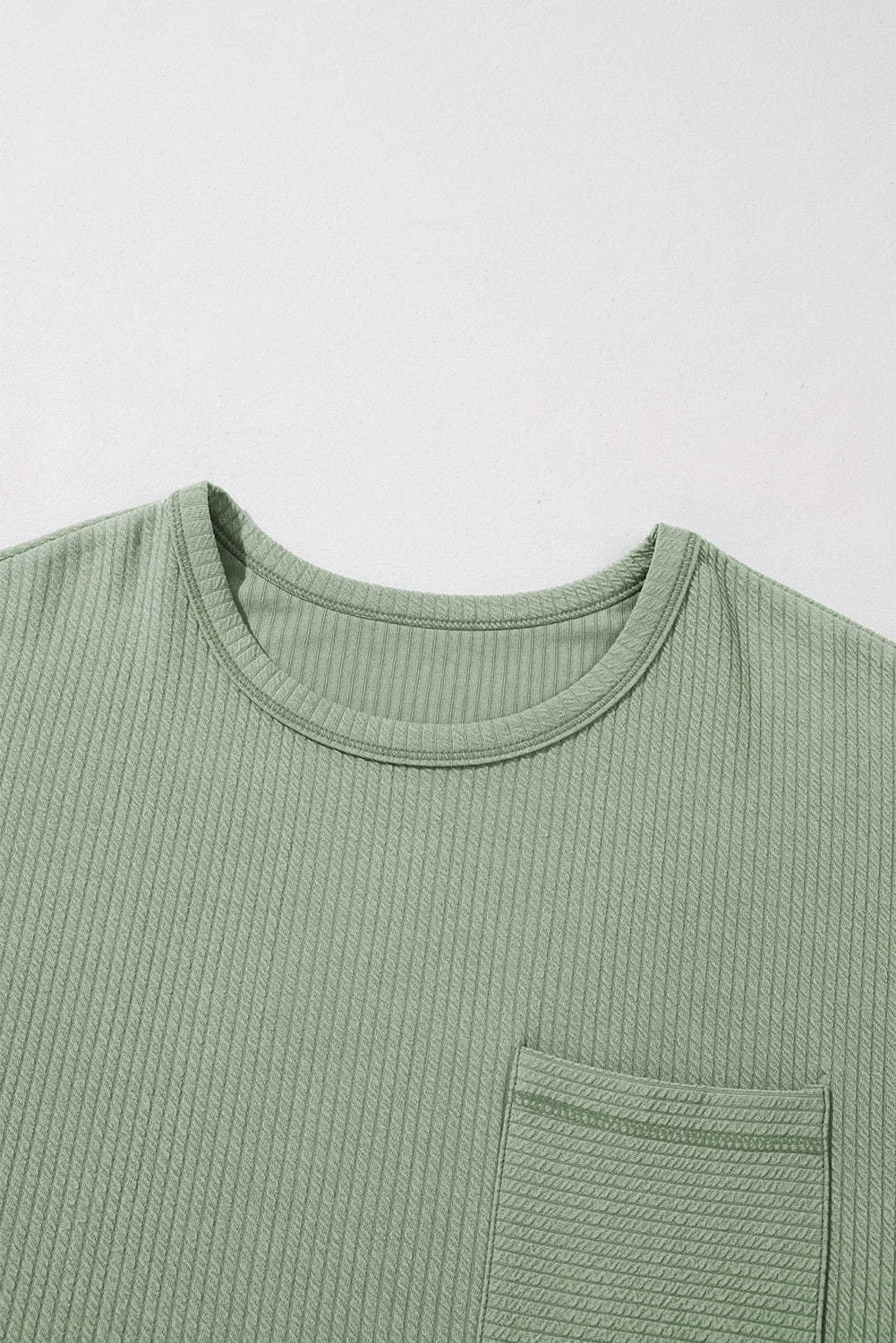 Clearly Aqua Pocketed Ribbed Long Sleeve TopMaterial:95%Polyester+5%Elastane

• Elevate your casual look with the top, blending comfort with style effortlessly.
• Crafted with a rib-knit design, this top off