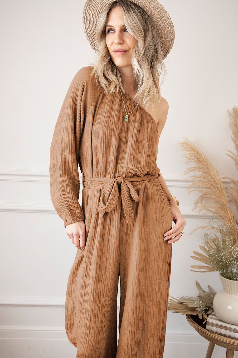 Khaki Crinkled Texture One Shoulder Loose JumpsuitMaterial:100%Cotton


	


		Turn heads with confidence in this flirty one-shoulder jumpsuit designed for women. 
	
	
		Crafted from lightweight and flowy mate