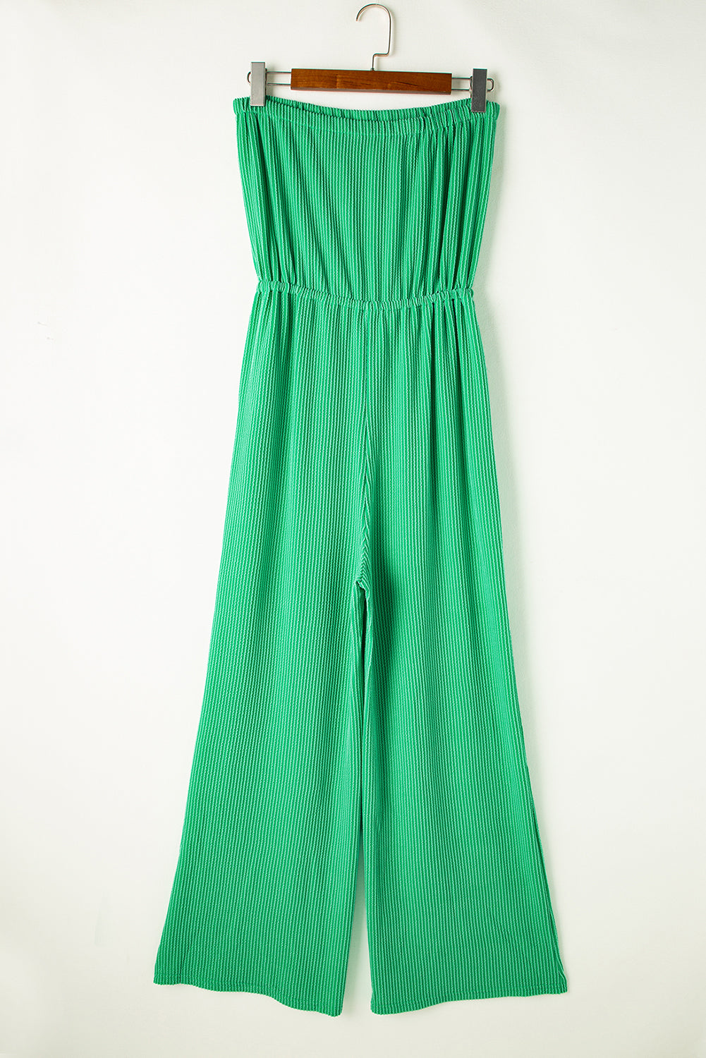 Sea Green Plain Ribbed Strapless Wide Leg JumpsuitMaterial:75%Polyester+20%Viscose+5%Elastane

• Effortlessly chic and versatile, this jumpsuit is a must-have for your summer wardrobe.
• Crafted from a breathable 