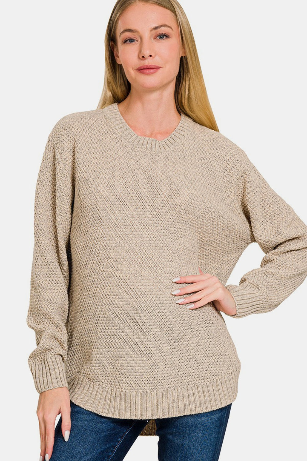 Zenana Ful Size Round Neck Long Sleeve Curved Hem SweaterThe round neck long sleeve curved hem sweater offers a timeless and versatile option for your winter wardrobe. With its classic round neckline and long sleeves, it p