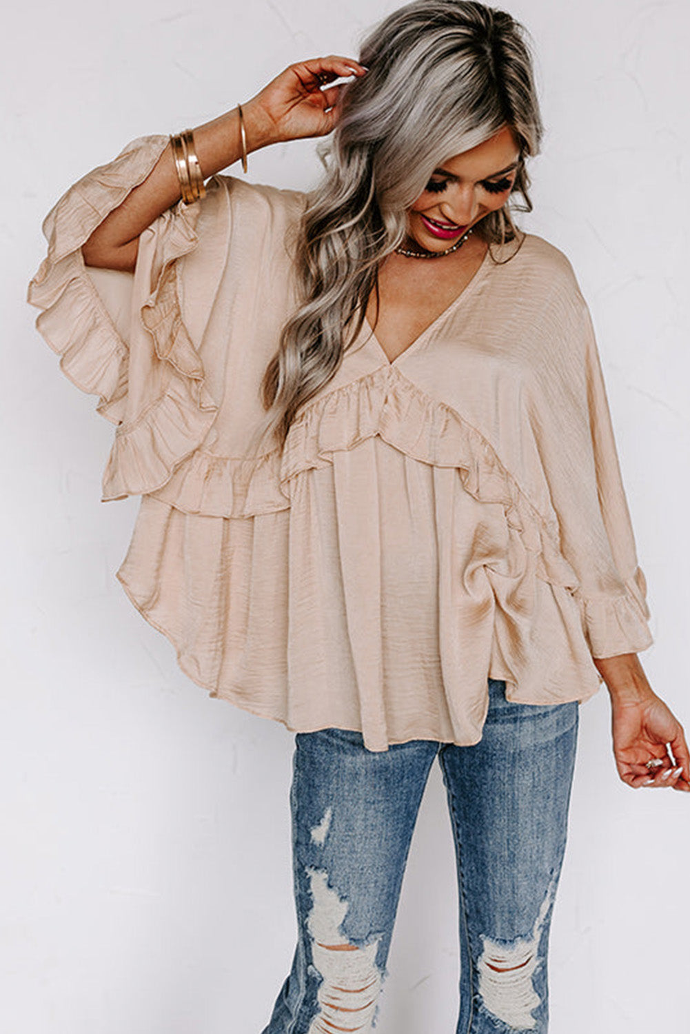 Apricot V Neck Draped Batwing Sleeve Ruffle TopMaterial:85%Viscose+10%Polyester+5%Elastane



		Elegant v-neckline accentuates collarbones
	
	
		Flowy draped fabric flatters all body types
	
	
		Batwing s