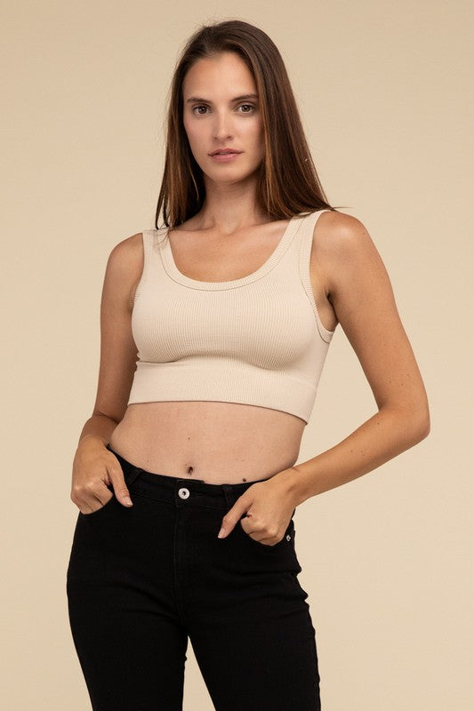 Ribbed Seamless Crop TopElevate your summer essentials with our Ribbed Seamless Crop Top, a versatile piece perfect for layering or wearing solo. Crafted with comfort in mind, it boasts a f