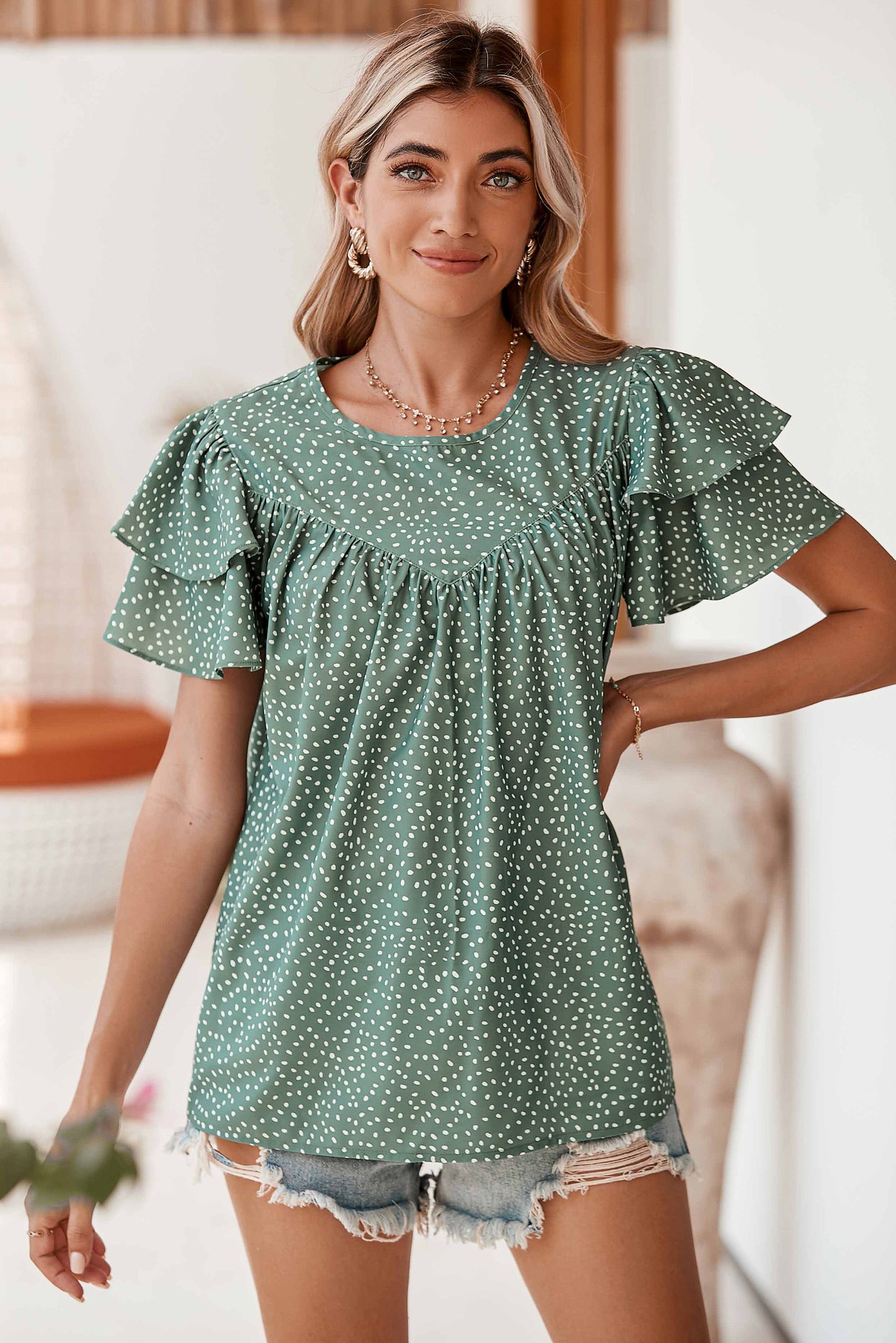 Laurel Green Spotted Print Pleated Ruffle Sleeve BlouseMaterial:100%Polyester



		The spotted print is a timeless and versatile choice that can easily be dressed up or down.
	
	
		The loose fit allows for a relaxed