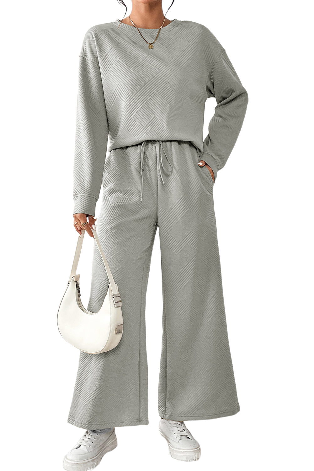 Red Dahlia Textured Loose Slouchy Long Sleeve Top and Pants SetMaterial:95%POLYESTER+5%ELASTANE



		Our Gray Textured Loose Slouchy Long Sleeve Top and Pants Set, a comfortable and stylish ensemble that is perfect for loungin