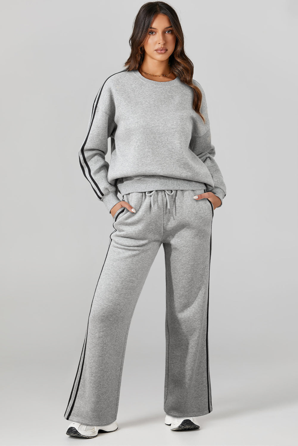 Light Grey Solid Color Side Striped Sweatshirt Pants SetMaterial:50%Polyester+50%Cotton

• This pants set exudes a modern appeal perfect for casual outings or lounging at home.
• Crafted from high-quality fabric for a s