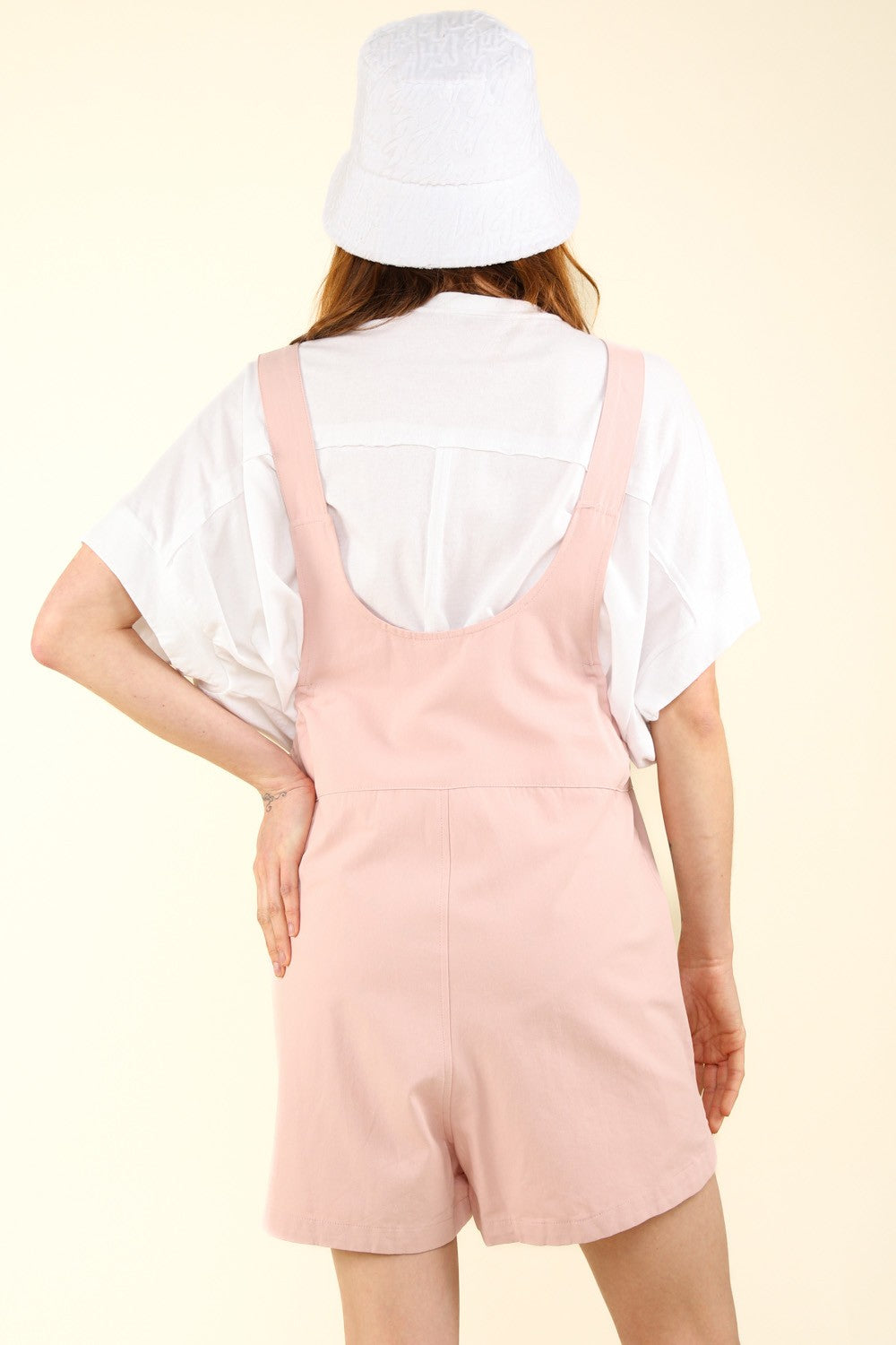 VERY J Adjustable Waist Suspender Overalls with PocketsGet ready for a casual and chic look with this sleeveless cotton romper featuring an adjustable waist and side pockets. The suspender's overall detail adds a trendy 