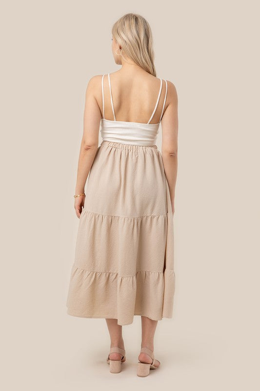 Tiered maxi skirt- Tiered maxi skirt- Pattern type : solid- Stretch : stretch- Sheer : Beige - lined and no see through / Black - not lined, but not very sheer- Care instruction : ma