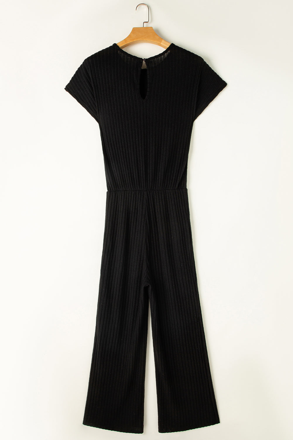 Grass Green Solid Color Ribbed Short Sleeve Wide Leg JumpsuitMaterial:85%Polyester+10%Viscose+5%Elastane



		The jumpsuit is a versatile and trendy one-piece outfit, featuring a solid color design that offers a sleek and mi