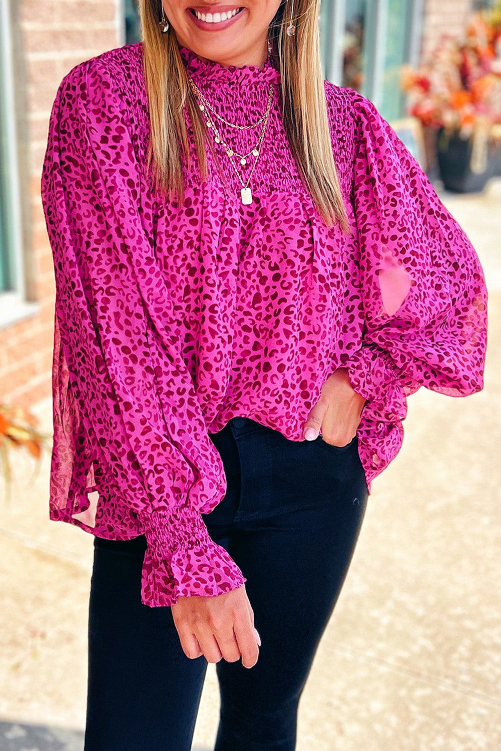 Rose Leopard Shirred Puff Sleeve Flowy BlouseMaterial:100%Polyester



		The blouse has a flowy silhouette, meaning it is loose and relaxed, draping away from the body. 
	
	
		The flowy silhouette of the b