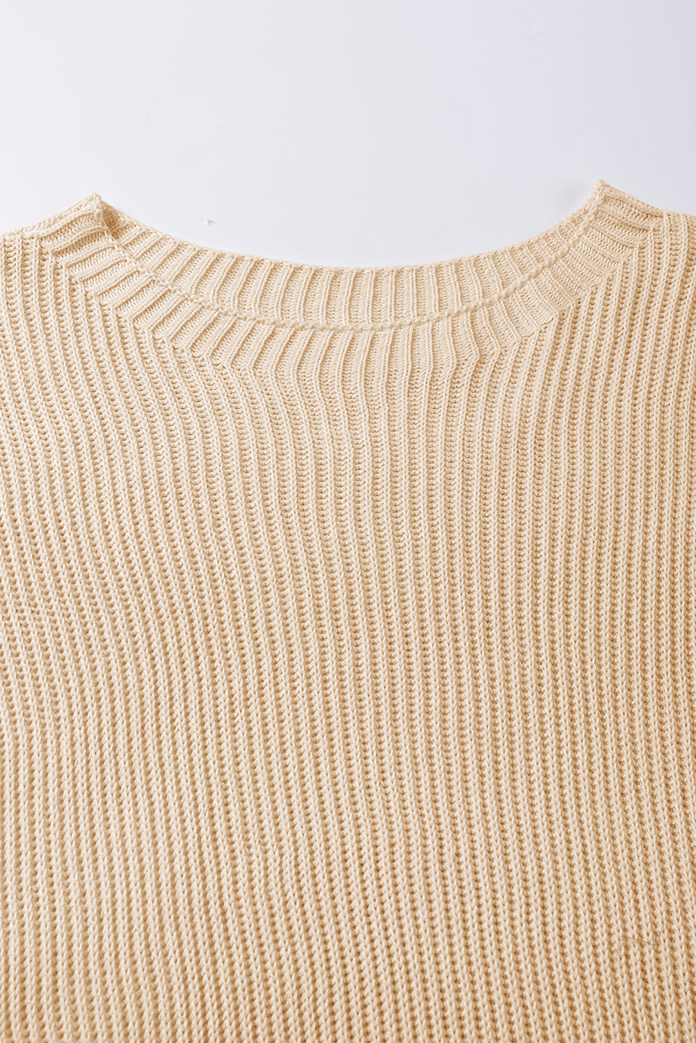 Apricot Side Slit Short Sleeve Oversized SweaterMaterial:55%Acrylic+45%Cotton



		The sweater is a comfortable and chic addition to your wardrobe. Made from breathable, lightweight, and stretchy knitted fabric,