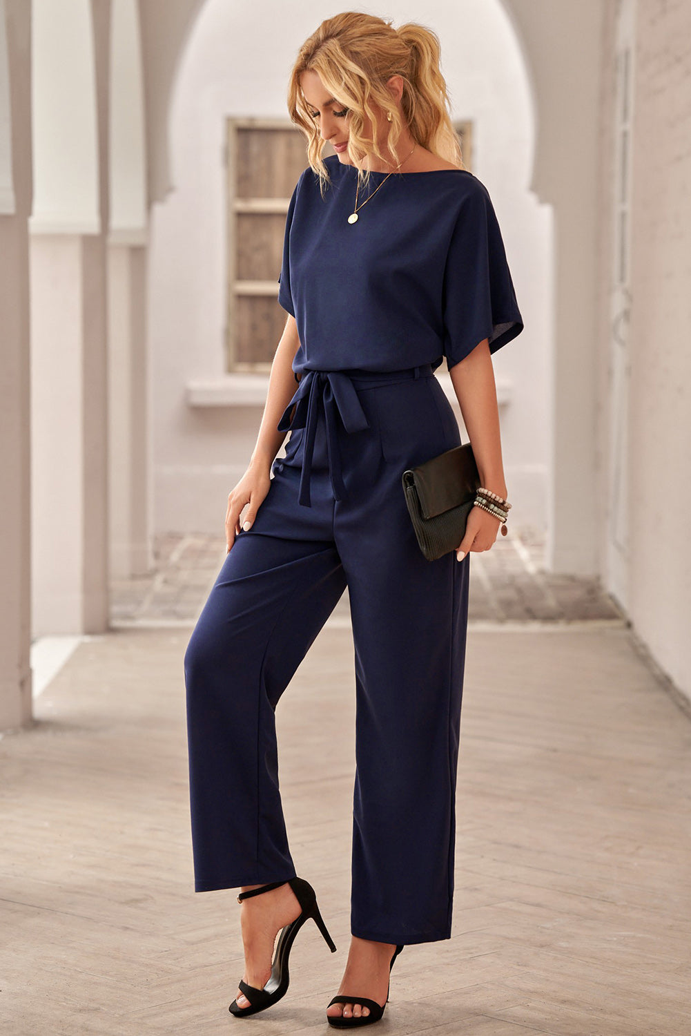 Dark Blue Solid Color Casual Belted Wide Leg JumpsuitMaterial:95%Polyester+5%Spandex



		You'll be looking oh so glam in this beaut jumpsuit
	
	
		A tie waist belt, batwing sleeve and wide leg
	
	
		The loose 