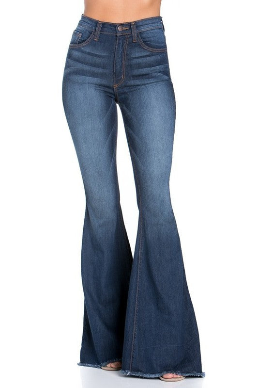 Logan Bell Bottom Jean- Inseam 32Full Length 5 Pocket Flare Jean features frayed hem, dark wash, whisker wash detail, Stretch denim, front and back pockets, 32" Inseam, Made in USA 
Style: high rise