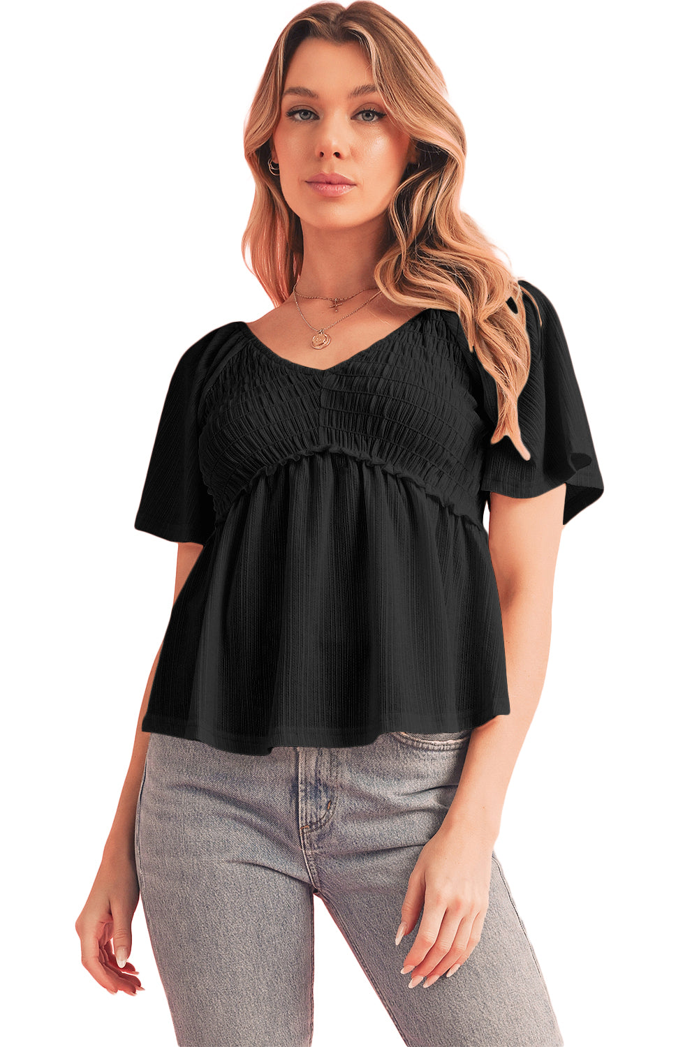 Tomato Red Shirred V Neck Short Flutter Sleeve Textured BlouseMaterial:95%POLYESTER+5%ELASTANE



		The blouse is a charming and feminine top featuring a shirred V-neckline and delicate flutter sleeves, adding a touch of eleg