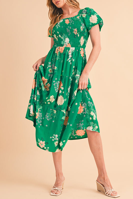 Green Floral Print Bubble Sleeve Smocked Tiered Midi DressMaterial:100%Viscose



		This chic dress adds a vibrant and feminine touch, creating a romantic look
	
	
		The smocked panel provides a fitted and flattering w