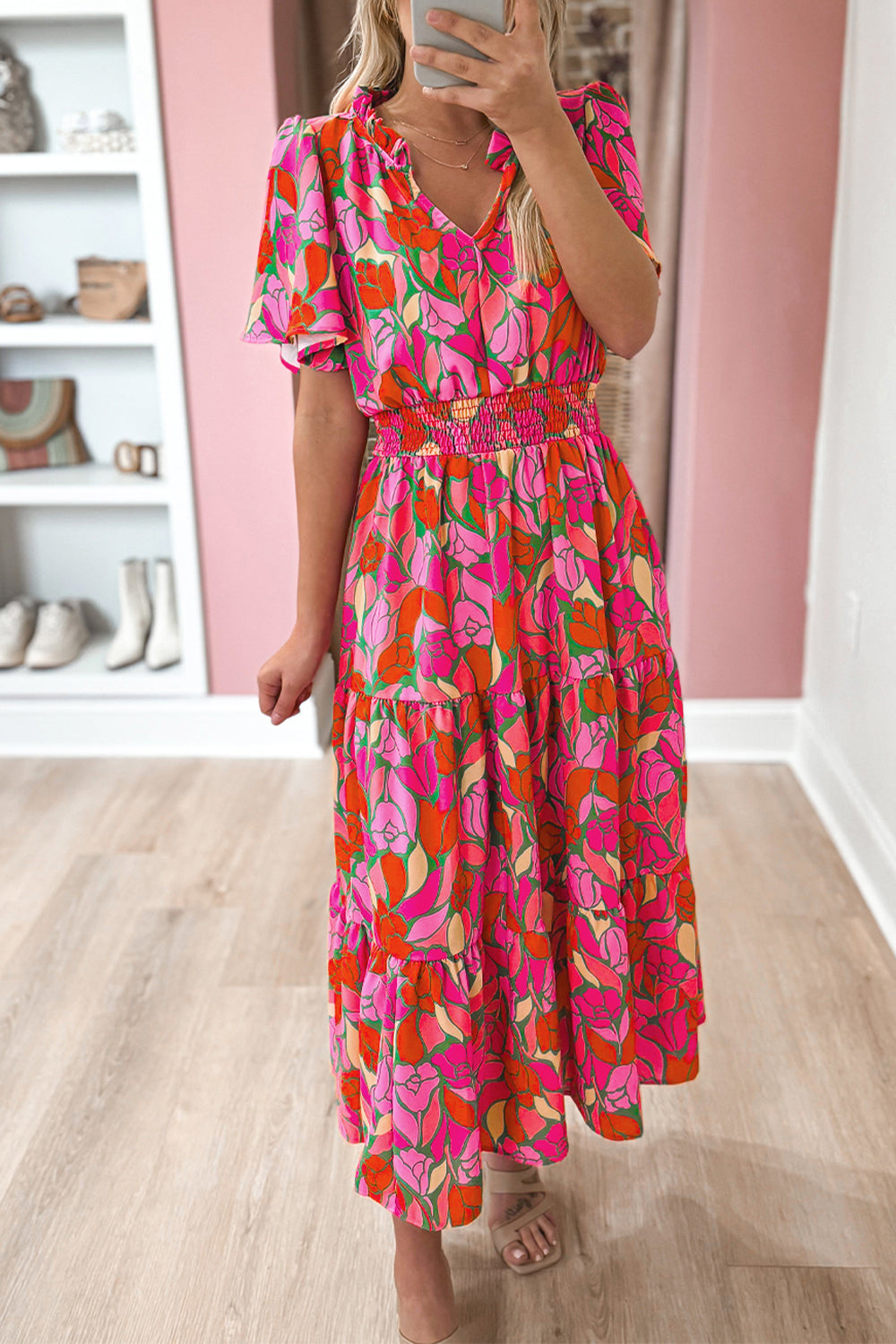 Rose Floral Flounce Sleeve Smocked Waist Tiered Maxi DressMaterial:100%Polyester

• Exude bohemian elegance in this maxi dress, featuring a smocked waist for a flattering silhouette.
• The tiered design adds a whimsical t