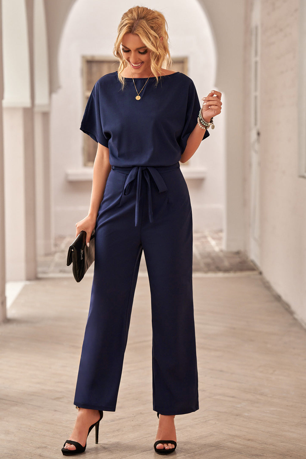 Dark Blue Solid Color Casual Belted Wide Leg JumpsuitMaterial:95%Polyester+5%Spandex



		You'll be looking oh so glam in this beaut jumpsuit
	
	
		A tie waist belt, batwing sleeve and wide leg
	
	
		The loose 