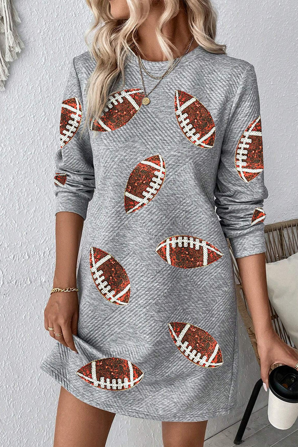 Gray Sequin Rugby Graphic Round Neck Textured Mini DressMaterial:97%Polyester+3%Elastane

• Shimmer and shine in the dress, perfect for adding a touch of glamour to your wardrobe. 
• With its long sleeves and round neck