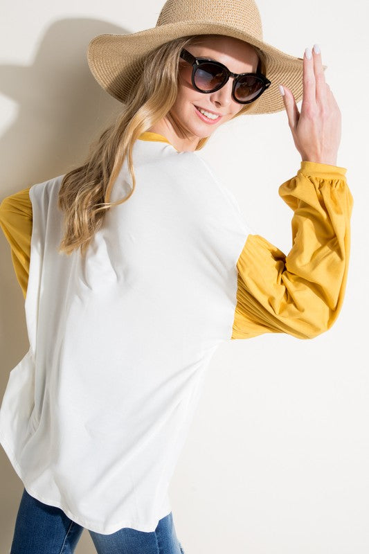 COLOR BLOCK VOLUME PUFF SLEEVE TOPSOLID JERSEY COLOR BLOCK VOLUMED PUFF LONG SLEEVE ROUND NECK TOP95% RAYON, 5% SPANDEX MADE IN USAS/M/L 2-2-2
Style: Casual
Print / Pattern: SOLID
Fit: Loose
Neck Lin