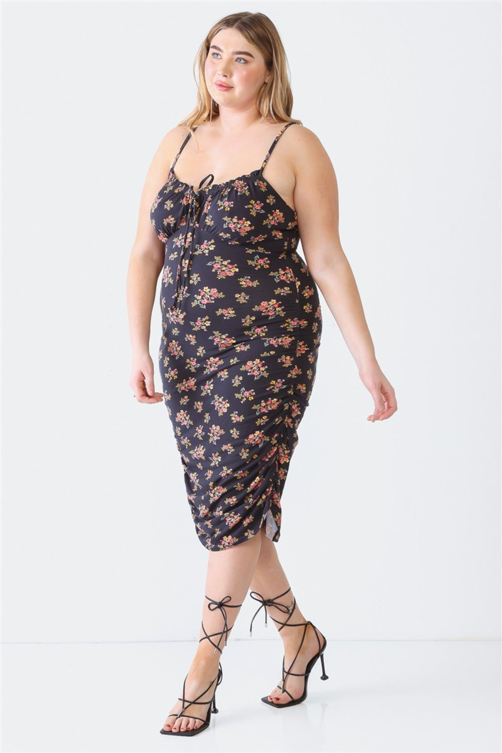 Blue Leopard Plus Size Ruched Floral Square Neck Cami DressRuched Floral Square Neck Cami Dress is a trendy and feminine piece that effortlessly combines style and comfort. The square neckline adds a chic touch, while the ru