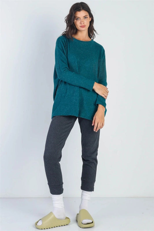 Cherish Apparel Round Neck Long Sleeve SweaterThe Round Neck Long Sleeve Sweater is a classic and versatile wardrobe staple that offers both style and comfort. The round neckline provides a timeless look that ca