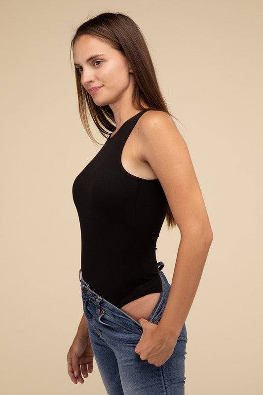 Boat Neck Sleeveless Padded BodysuitThe Boat Neck Sleeveless Padded Bodysuit offers both style and comfort. With its boat neckline and sleeveless design, it provides a sleek and elegant look. The padde