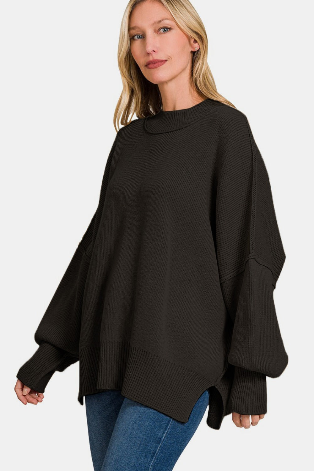 Zenana Side Sit Oversize SweaterSide Slit Oversize Sweater is a trendy and comfortable choice for your casual wardrobe. The oversized fit adds a relaxed and effortless vibe to your outfit. With sid