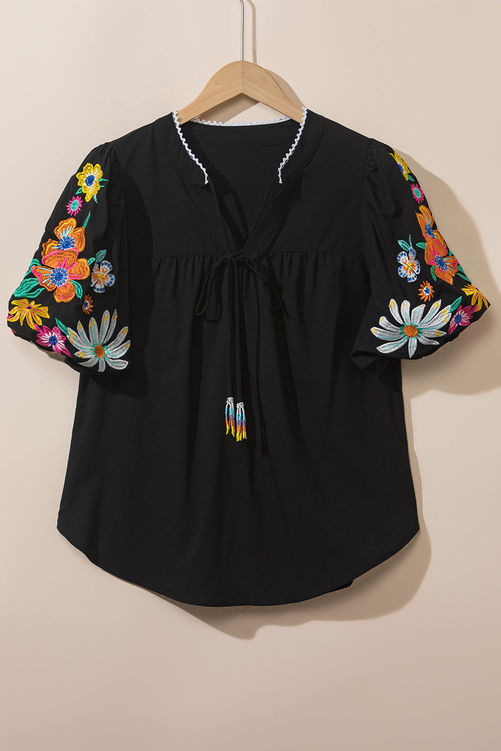 Mineral Red Floral Embroidered Puff Sleeve Split Neck BlouseMaterial:100%Cotton

• Radiate bohemian charm with the Mineral Red blouse featuring intricate floral embroidery and puff sleeves, perfect for a free-spirited look.

