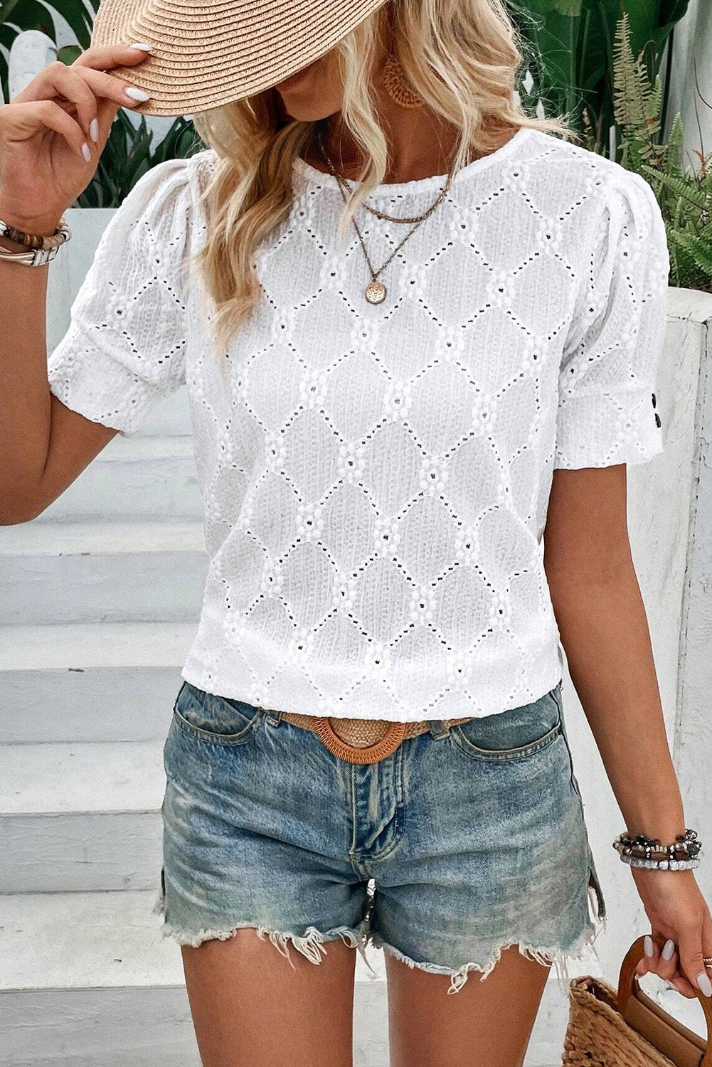 White Eyelet Embroidered Short Puff Sleeve BlouseMaterial:95%Polyester+5%Elastane

• This blouse exudes elegance with its delicate eyelet embroidery, adding a touch of sophistication to any outfit.
• The plain wh