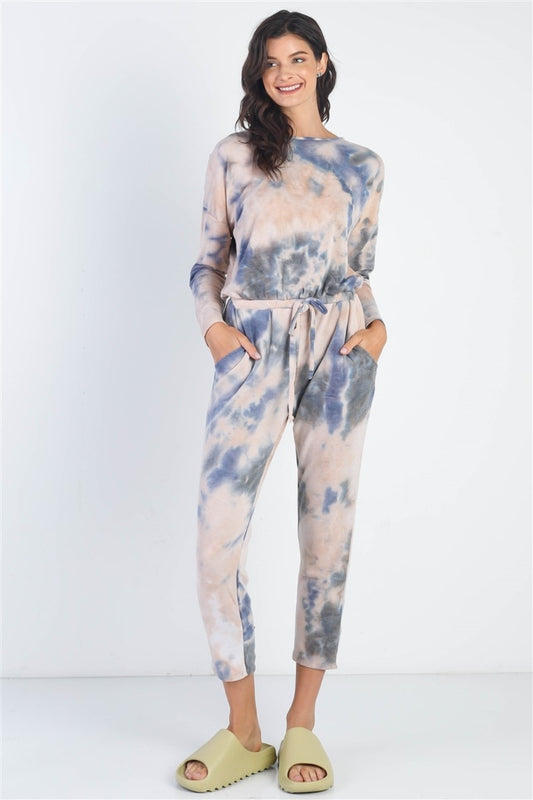 Cherish Apparel Tie-Dye Round Neck Long Sleeve JumpsuitThis Jumpsuit is the perfect choice for a stylish and eye-catching street-style look. Its trendy tie-dye print and casual design make it both comfy and chic. With fe