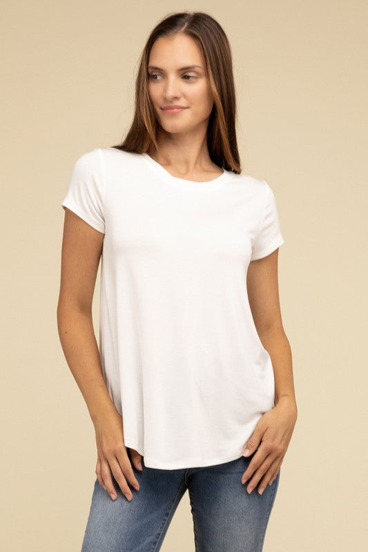 Flowy Round Hem Rayon Short Sleeve TopThe Flowy Round Hem Rayon Short Sleeve Top is the perfect addition to your casual wardrobe. Crafted from soft, lightweight rayon, this top features a relaxed fit and