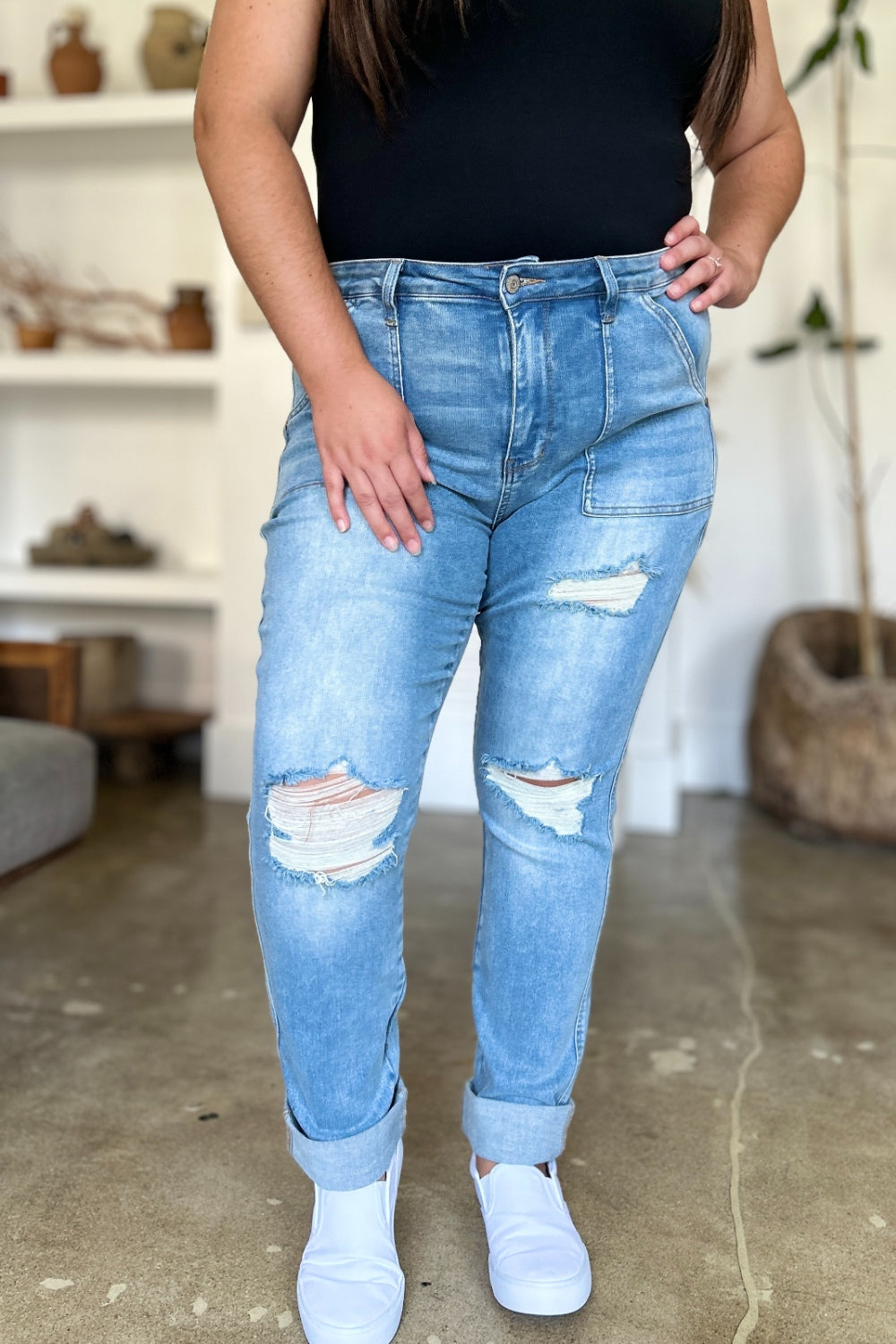 Judy Blue Full Size Distressed Straight Jeans with Patch PocketsThese distressed straight jeans feature stylish patch pockets for added flair. The distressed detailing adds a trendy touch to your look. The straight cut offers a f