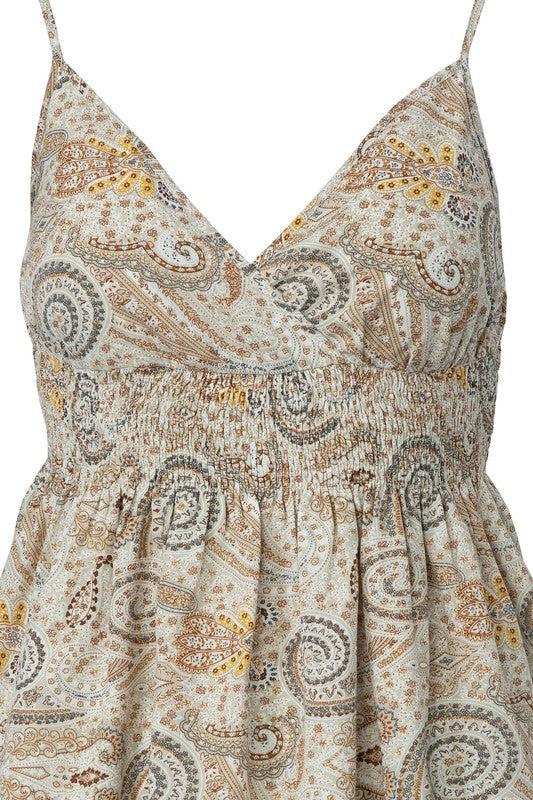 A line cami top- A line cami top with adjustable shoulder straps- Pattern type : paisley print- Sleeve type : sleeveless- Stretch : no stretch- Sheer : lined. no see through- Care 