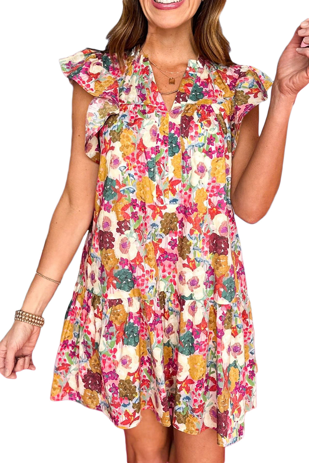 Purple Floral Print Split Neck Ruffle Mini DressMaterial:81%Viscose+19%Polyamide

• Embrace an enchanting aura with the mesmerizing purple floral print that adorns this boho-chic mini dress, perfect for garden pa