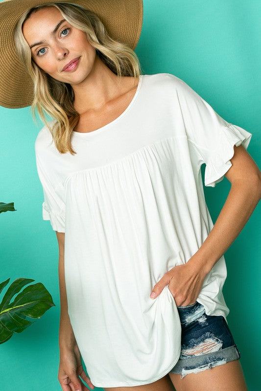 SOLID RUFFLED SL BABY DOLL TOPSOLID JERSEY ROUND NECK RUFFLED SHORT SLEEVE BABY DOLL TOP95% RAYON, 5% SPANDEX MADE IN USAS/M/L 2-2-2
Style: Casual
Print / Pattern: SOLID
Fit: Loose
Neck Line: ROU