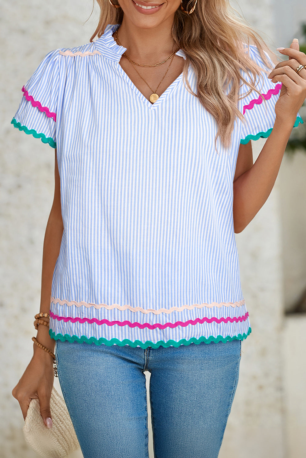 Sky Blue Striped Ricrac Splicing Frill V-Neck BlouseMaterial:100%Cotton



		Playful stripes: This blouse features a fun striped pattern with flirty frill details and a flattering V-neck.
	
	
		Chic and charming: