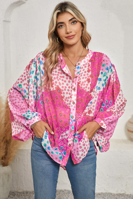 Rose Red Floral Print Dolman Sleeve BlouseMaterial:100%Polyester



		This blouse combines a beautiful floral print with colorblock panels for a touch of modern flair. 
	
	
		The dolman sleeves add a re