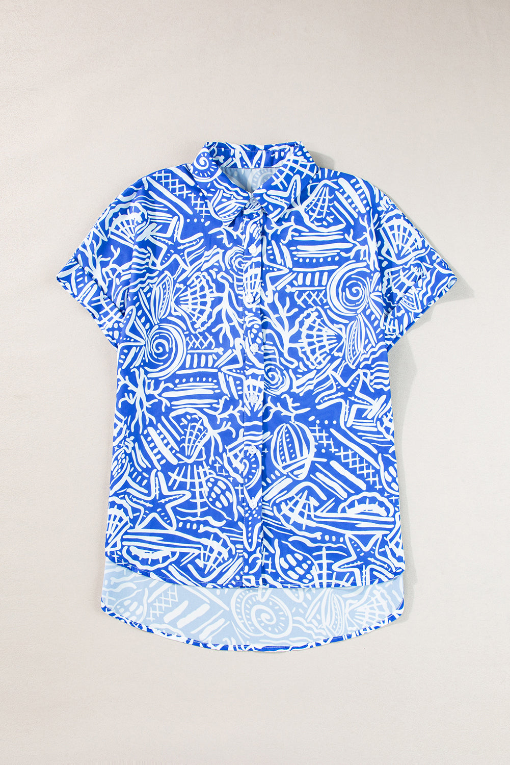 Blue Abstract Print Cuffed Sleeve Button Up BlouseMaterial:100%Polyester

• Stand out in style with our shirt, featuring a vibrant boho abstract design that exudes artistic flair.
• Embrace versatility with this s