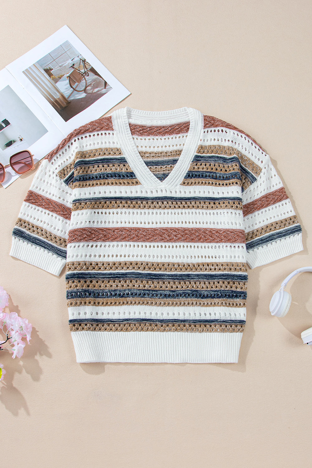 Multicolour Striped V Neck Hollow Knitted Half Sleeve SweaterMaterial:100%Polyester

• The rib-knit design offers a cozy fit suitable for any casual occasion.
• Stay stylish and comfortable in this trendy piece featuring hol