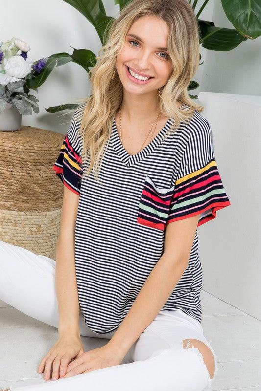 MULTI STRIPE BOXY TOP- Multi stripe boxy top- Pullover short sleeves- V neck chest pocket- Multi stripe jersey - Model is 5' 8" 34-24-34 and wearing a Small- S/M/L 2-2-2- 95% RAYON, 5% S