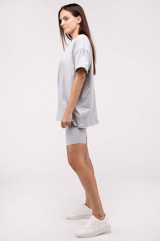 Cotton Round Neck Top & Biker Shorts SetThe Cotton Round Neck Top &amp; Biker Shorts Set is a stylish and versatile ensemble perfect for casual days or active wear. The top features a classic round necklin