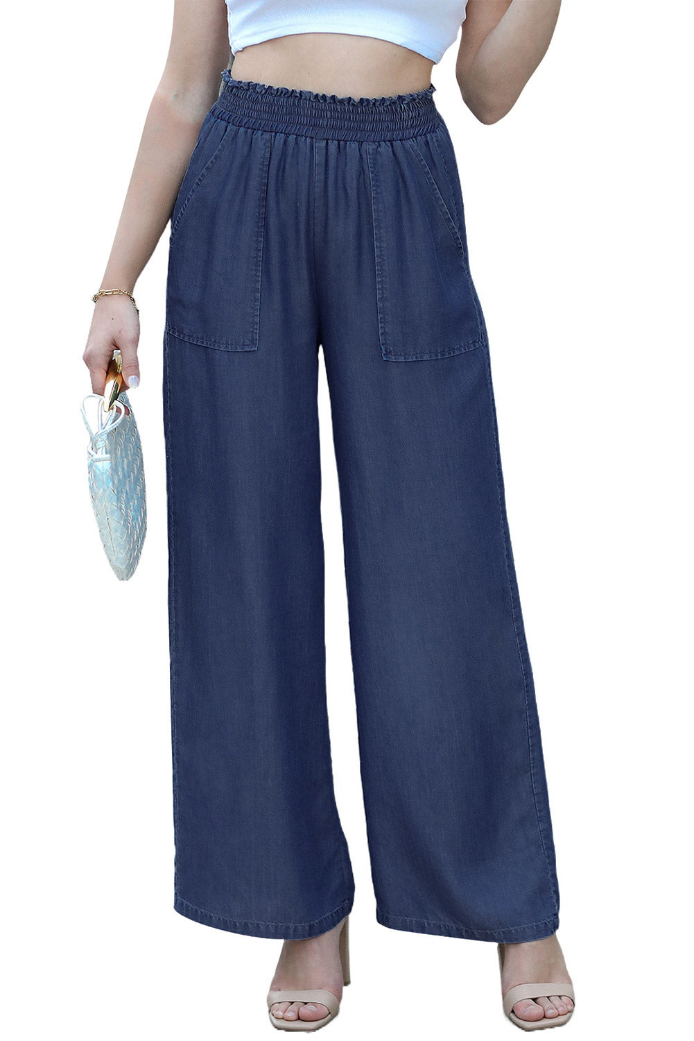 Sail Blue Side Pockets Frilled Smocked High Waist Wide Leg JeansMaterial:100%Lyocell

• Embrace a seaside vibe with these jeans featuring side pockets for practicality and frilled detailing for a touch of playful charm.
• Eleva