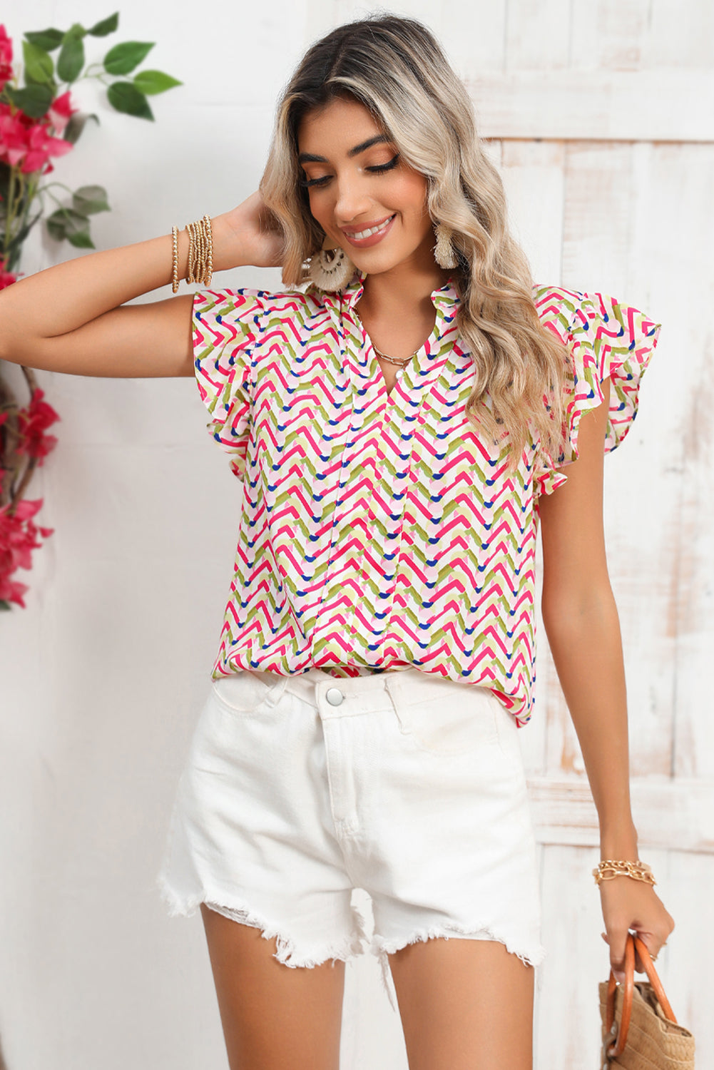 Multicolor Chevron Print Frill V Neck Ruffle BlouseMaterial:100%Polyester



		Be a style icon in this printed blouse
	
	
		This stylish top is featured with chevron print all over
	
	
		It has a ruffled notc