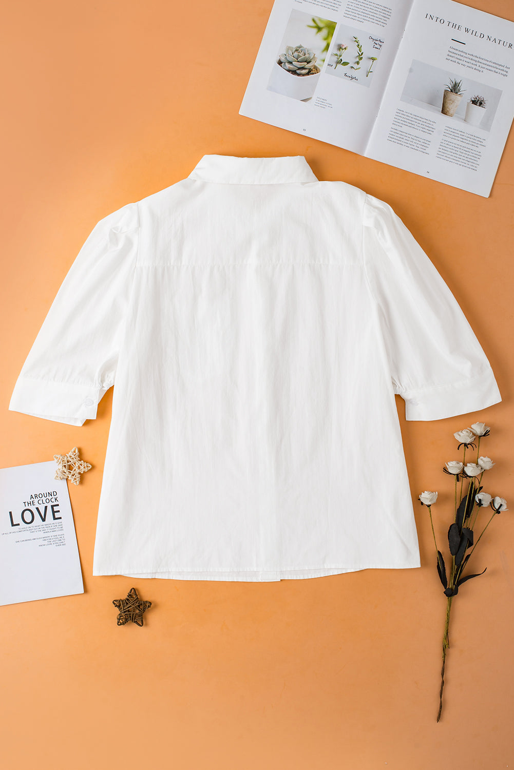 White Solid Color Button Up Puff Sleeve ShirtMaterial:100%Cotton



		Elevate your wardrobe with our shirt, crafted from a crisp and versatile fabric that offers a timeless appeal.
	
	
		This shirt feature